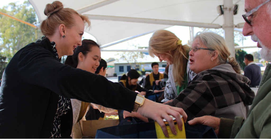 COMMUNITY FIRST: Cr Cheryl Bromage distributes hampers with the Tzu Chi Buddhist group at Brassall. Cr Bromage is also pictured (below) with sailor Jessica Watson and bilby saviour Frank Manthey during her work providing a home for the marsupial in Ipswich. COMMUNITY FIRST: Cr Cheryl Bromage distributes hampers with the Tzu Chi Buddhist group at Brassall. Cr Bromage is also pictured (below) with sailor Jessica Watson and bilby saviour Frank Manthey during her work providing a home for the marsupial in Ipswich.